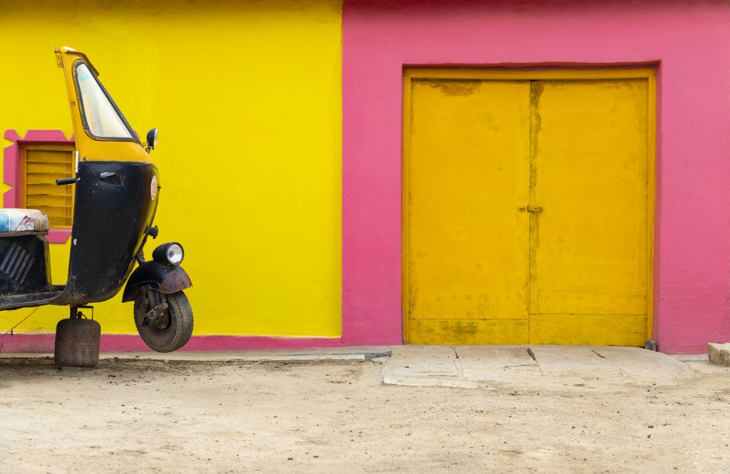 Picture of my choice because I liked the support under the auto rickshaw and walls colors are like a cherry on the top.Location: southern part of India. KGF, Kolar, Karnatka, India